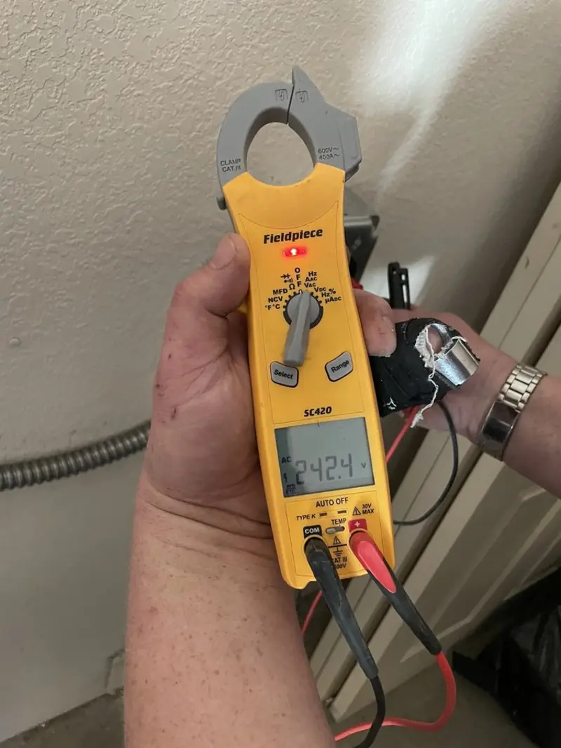 Voltage testing with clamp meter during Whole House Surge Protector in Hackettstown